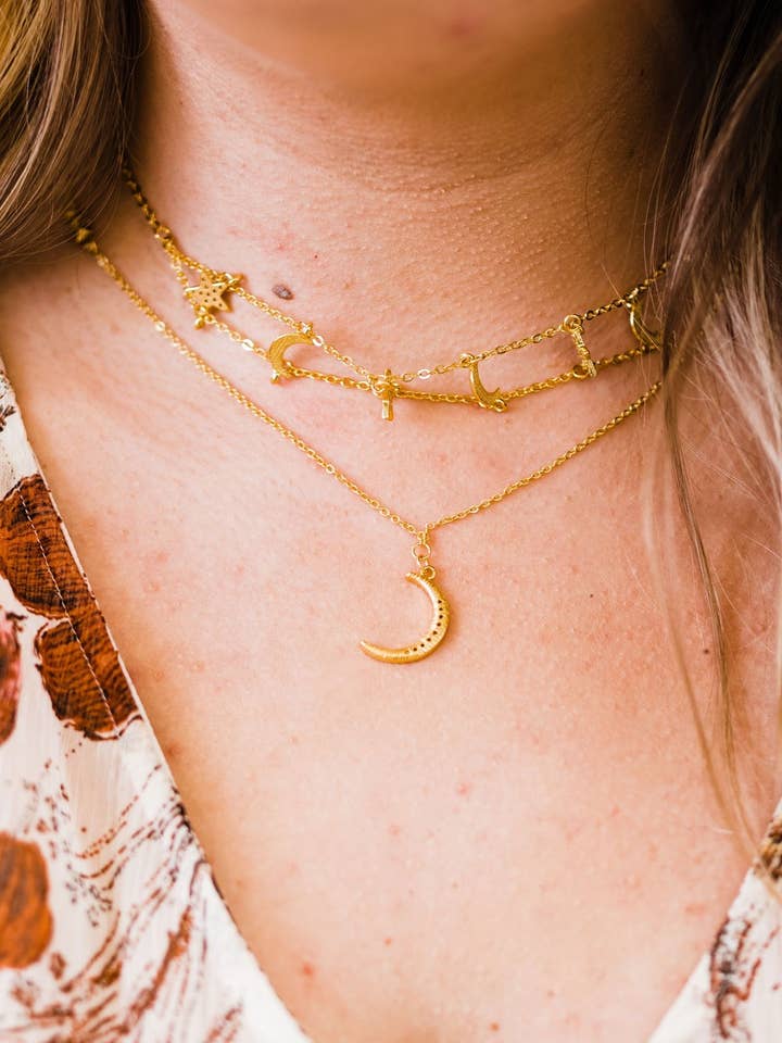 Aurora Sun + Star Necklace for wholesale by modern and chic