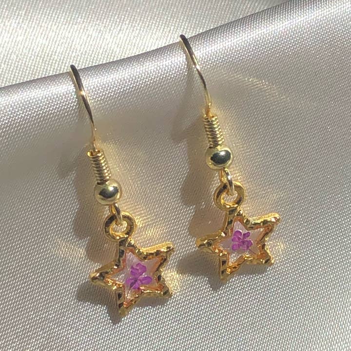 Boucles d'oreilles Star Blossom pour la vente par Morpha Morabeza