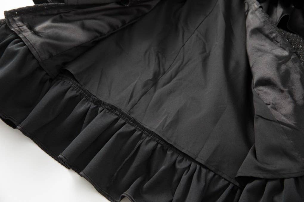 Negro CT110L Rompevientos de Pastel con Volantes y Borlas Hechas a Mano de venta al por mayor en Faire7