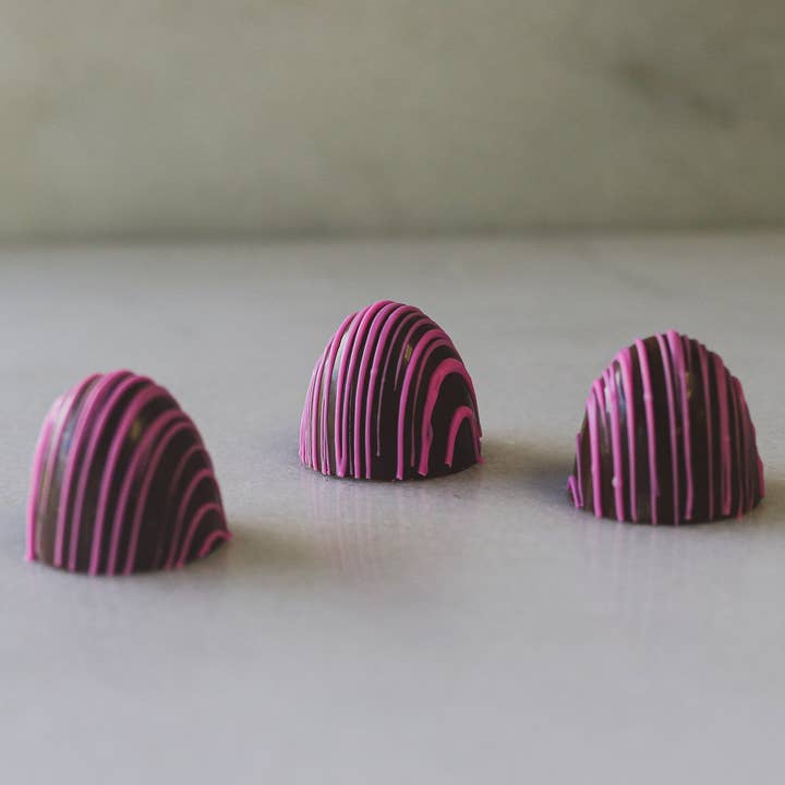 Strawberry Truffles / 2.6lb. Case for wholesale by Maggie Lyon Chocolatiers