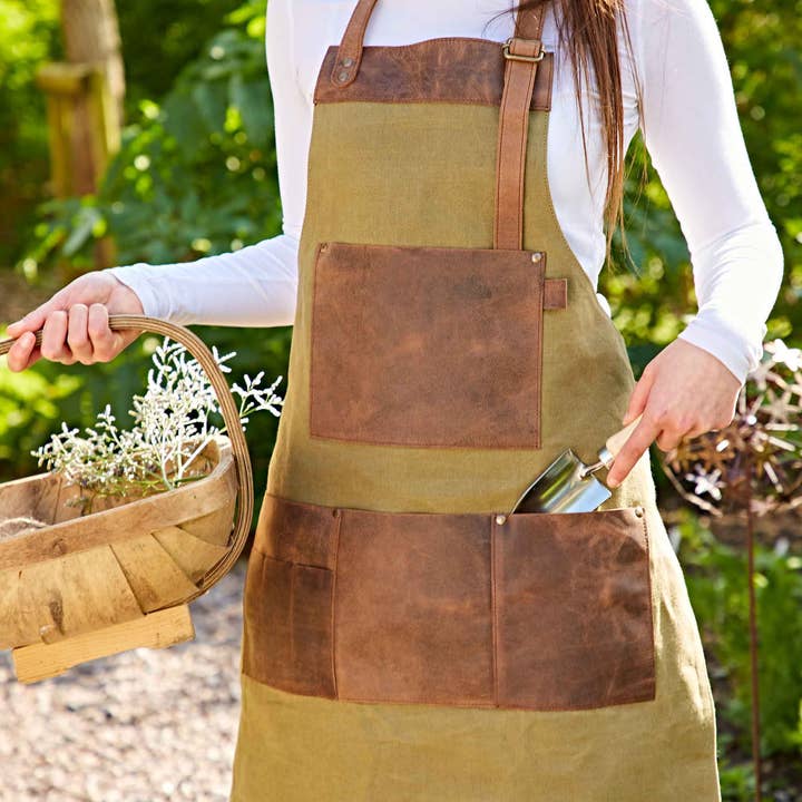 Green Canvas and Leather Apron - Handmade and other Purchase Wholesale green aprons. Free Returns & Net 60 Terms on Faire trending on Faire.