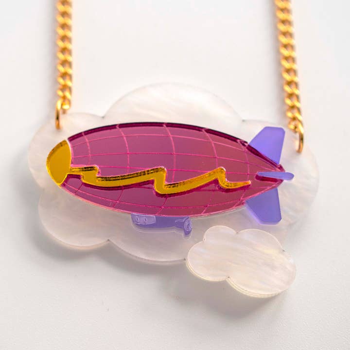 Big pink blimp necklace, Zeppelin with clouds laser cut for wholesale by designosaur
