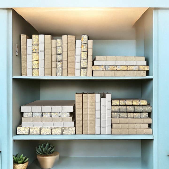 Curated Set of 33 Books with Off-White Covers for wholesale by E. Lawrence, Ltd.