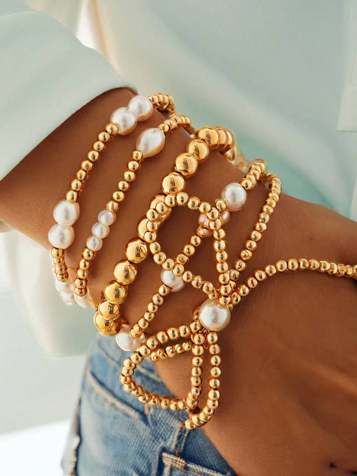 Ensemble de bracelets multicouches avec nœud papillon et perles Fashion-W pour la vente par fashionworks