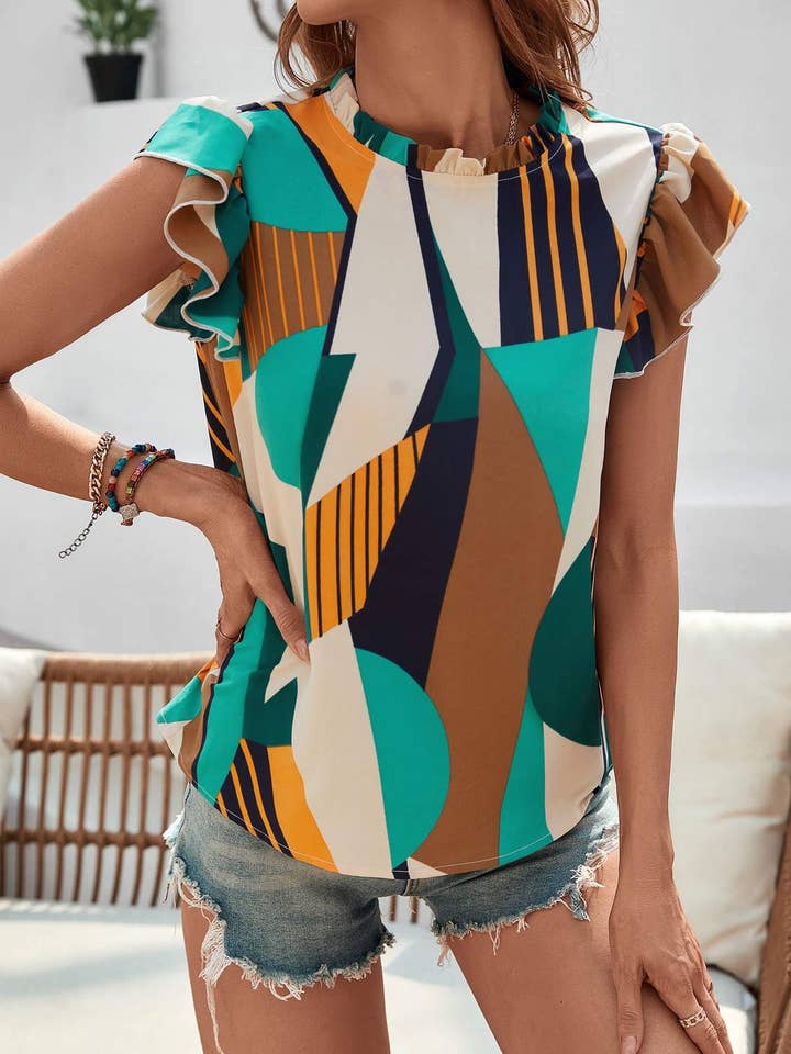 blusa con volant e collo a lupetto per la vendita all'ingrosso da parte di Queen Fashion