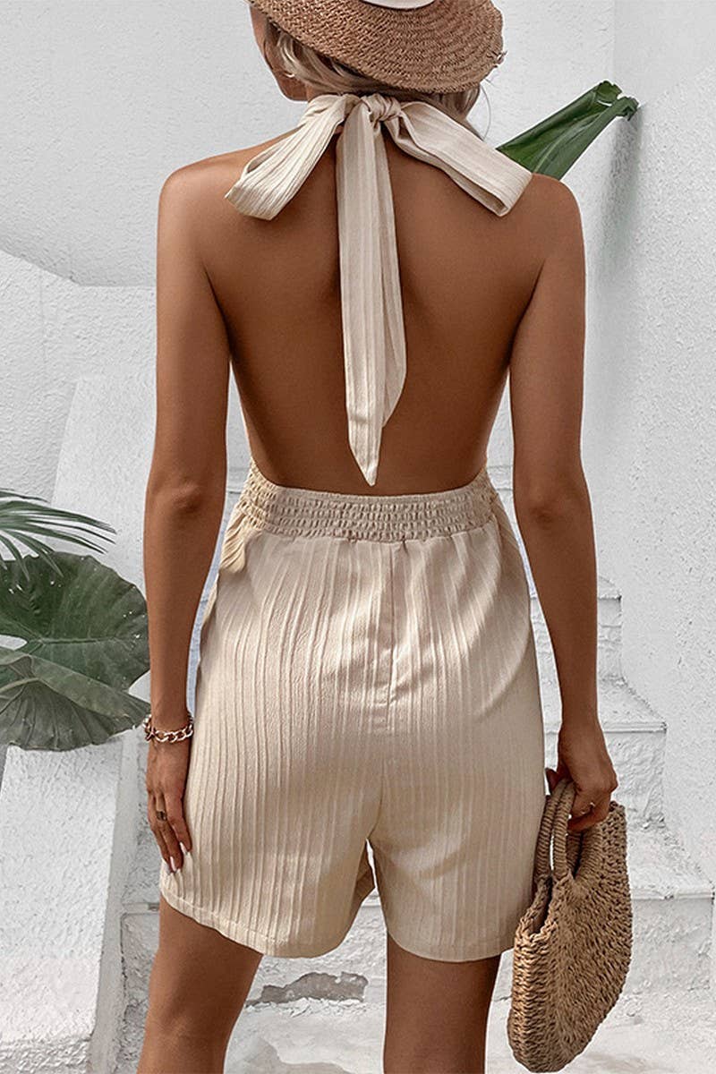 KHAKI CWSJS1667_SOLID COLOR HALTER NECK JUMPSUIT for wholesale on Faire3