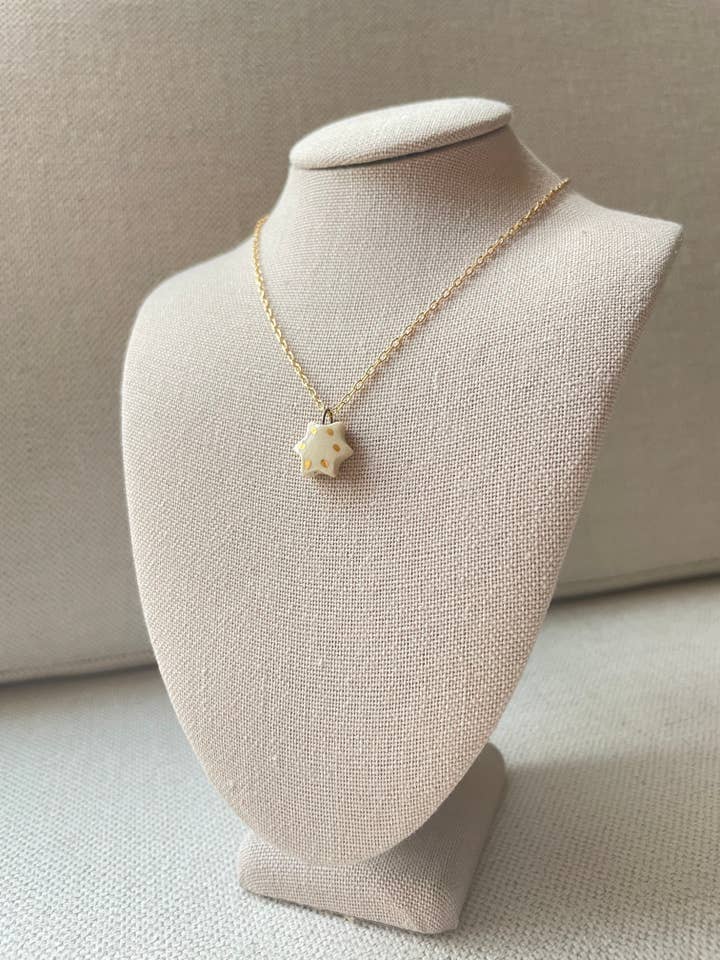 Tiny Magen Charm necklace for wholesale by Carola Spitzer