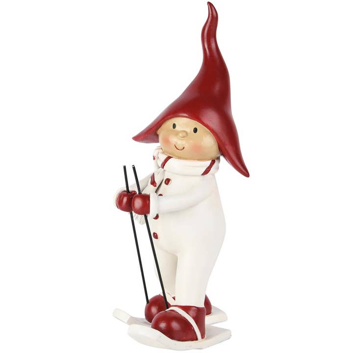 Vinterbarn på ski, hvid/rød, polyresin, 10x9x22cm for engroshandel hos Dekoratief