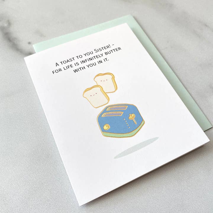 A Toast to You Sister! Gold Foil A2 Greeting Card for wholesale by ILOOTPAPERIE
