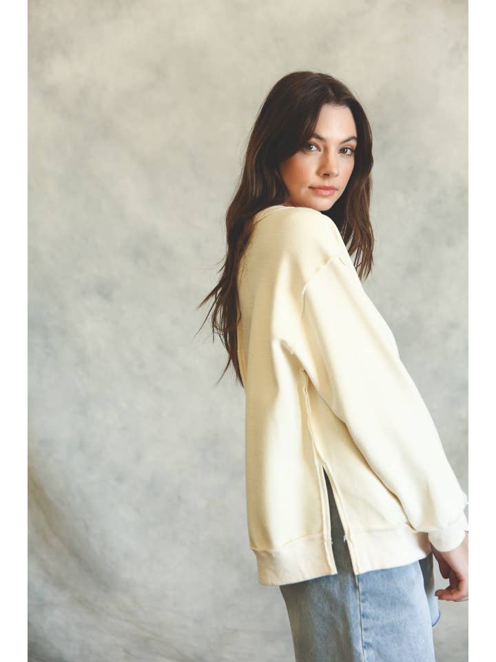 Cream Raw Edge Side Slit Sweatshirt for wholesale on Faire