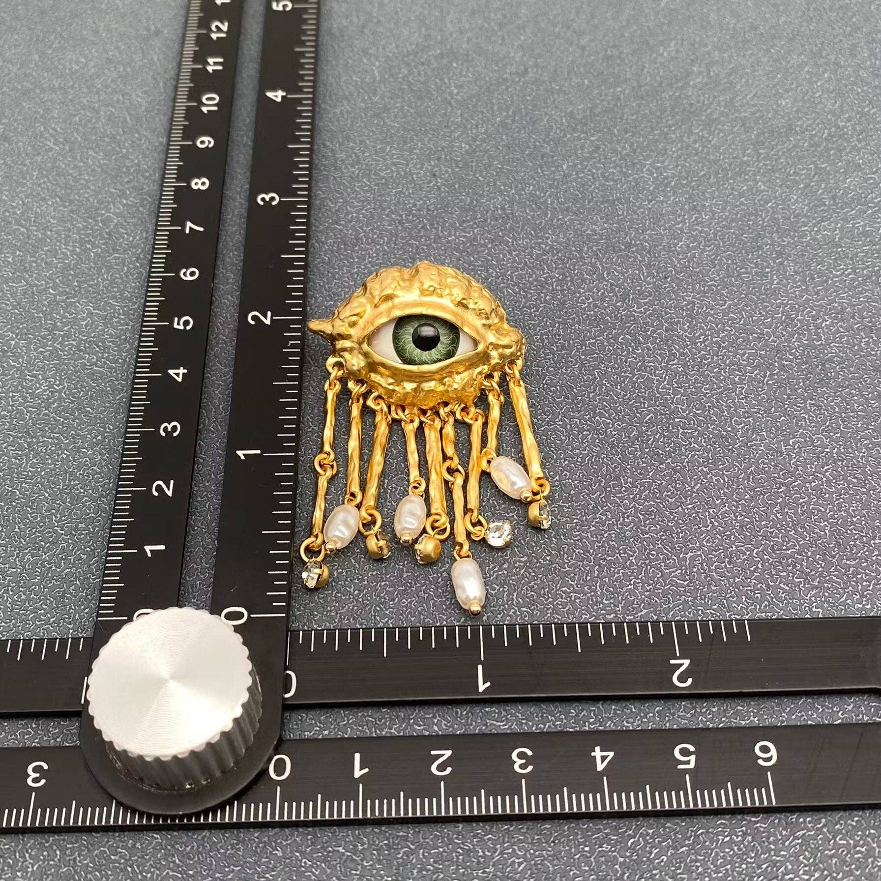 Mio Queena – wholesale Tofsörhängen – Turkey Evil Eye Pearl & CZ metall tofsstolpörhängen3