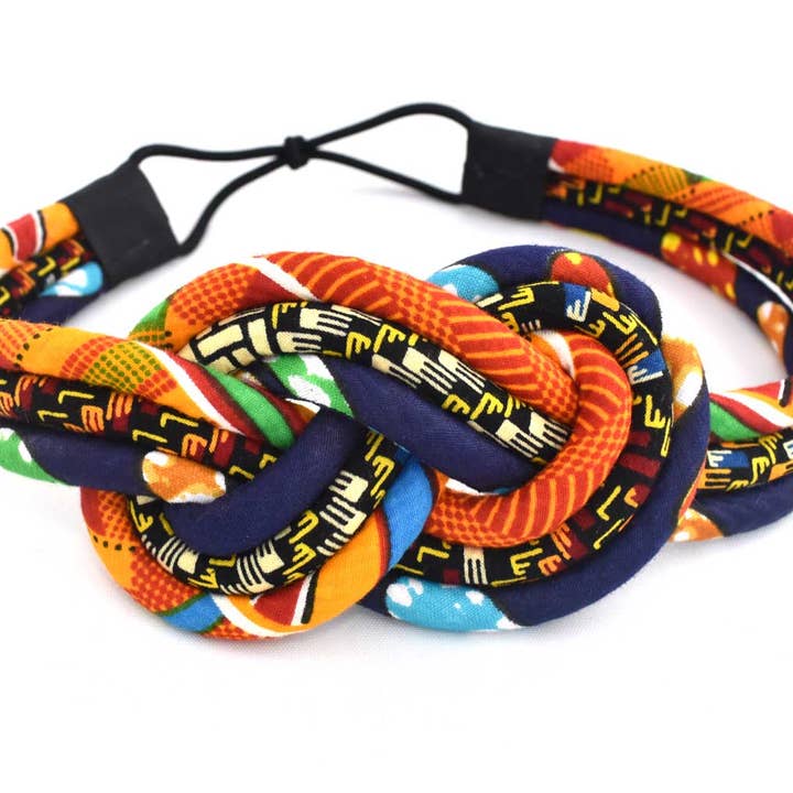 3-strängige Kopfbedeckung mit Kente Aufdruck | Orange geknotetes Stirnband für den Großhandel von Cloth & Cord, LLC