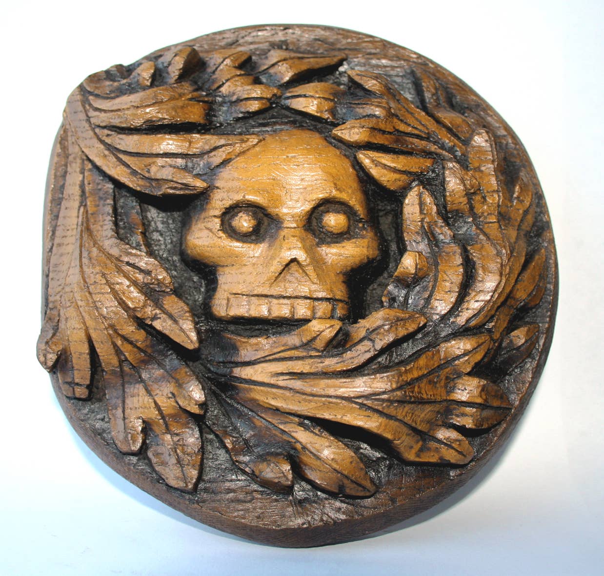 Oakapple Designs Ltd - Wholesale Decorative Figurine - Medieval Green Man Skull - Reproduction Misericord Carving.