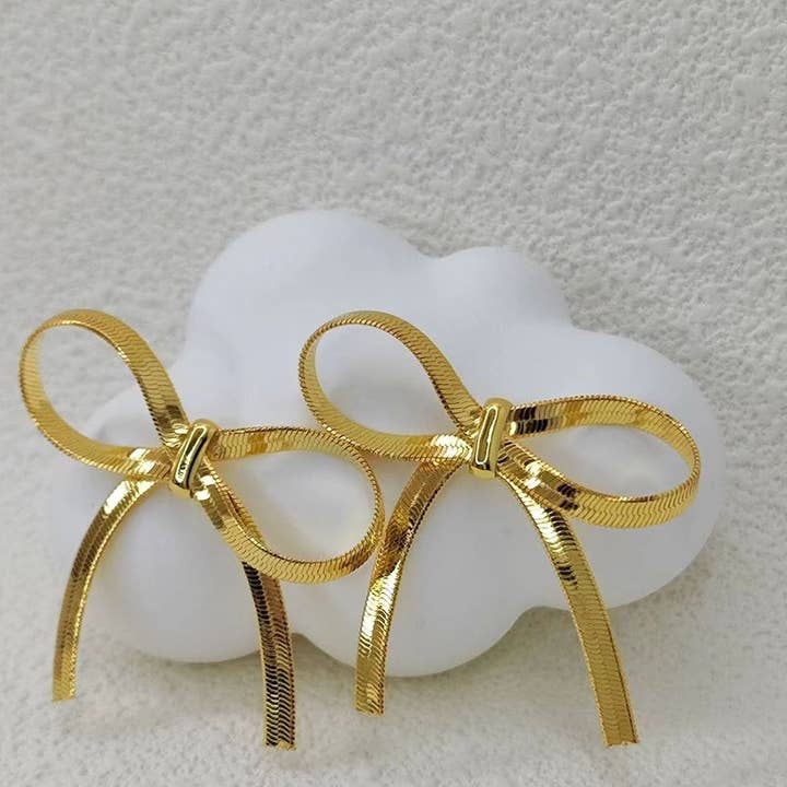 NINEXIS - Wholesale Dangle Earrings - CWAJE1209_THE BOW IS STUD 18K GOLD PLATED EARRINGS