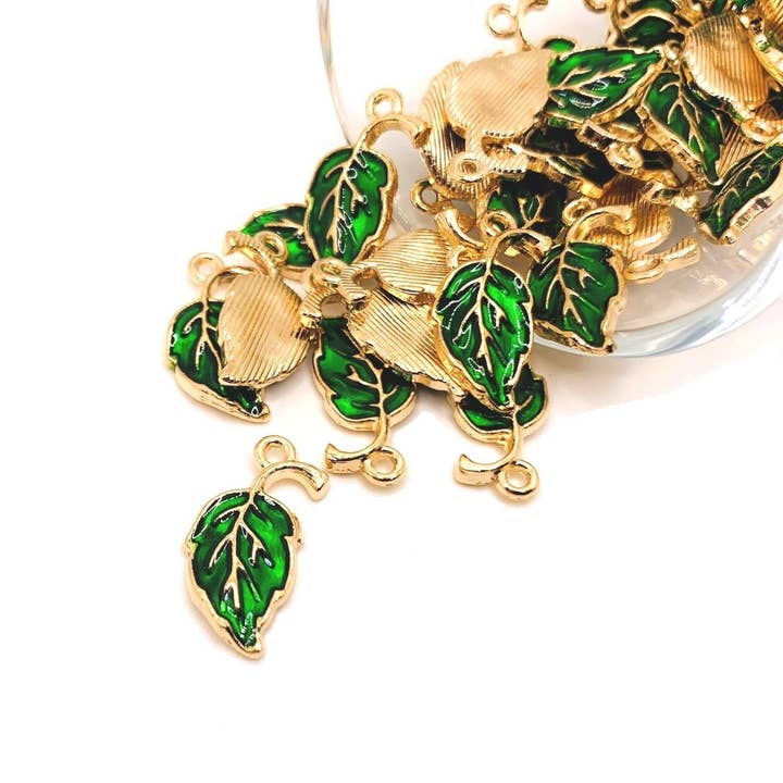 Green and Gold Curved Leaf Charms, 20x10mm for wholesale by Guerrilla Charm