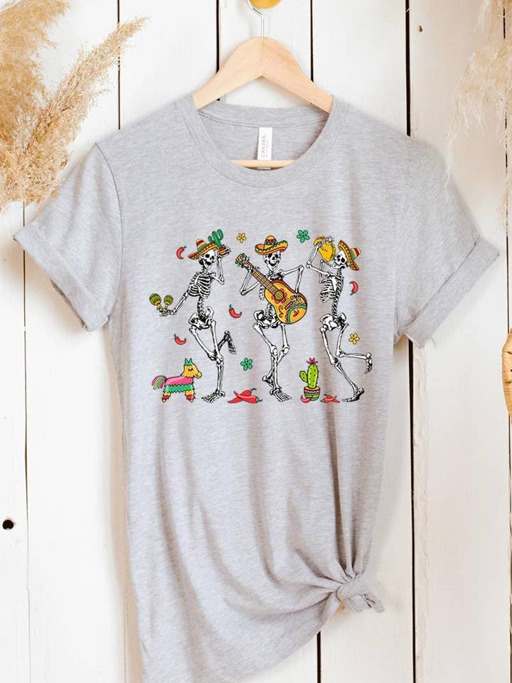 Cinco De Mayo Skeleton Graphic Tee and other Purchase Wholesale cinco mayo. Free Returns & Net 60 Terms on Faire trending on Faire.