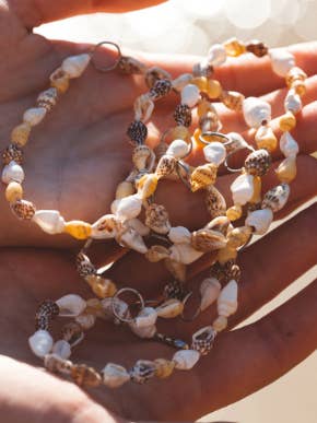 Cadena de conchas marinas para venta al por mayor de Coral Swimwear X