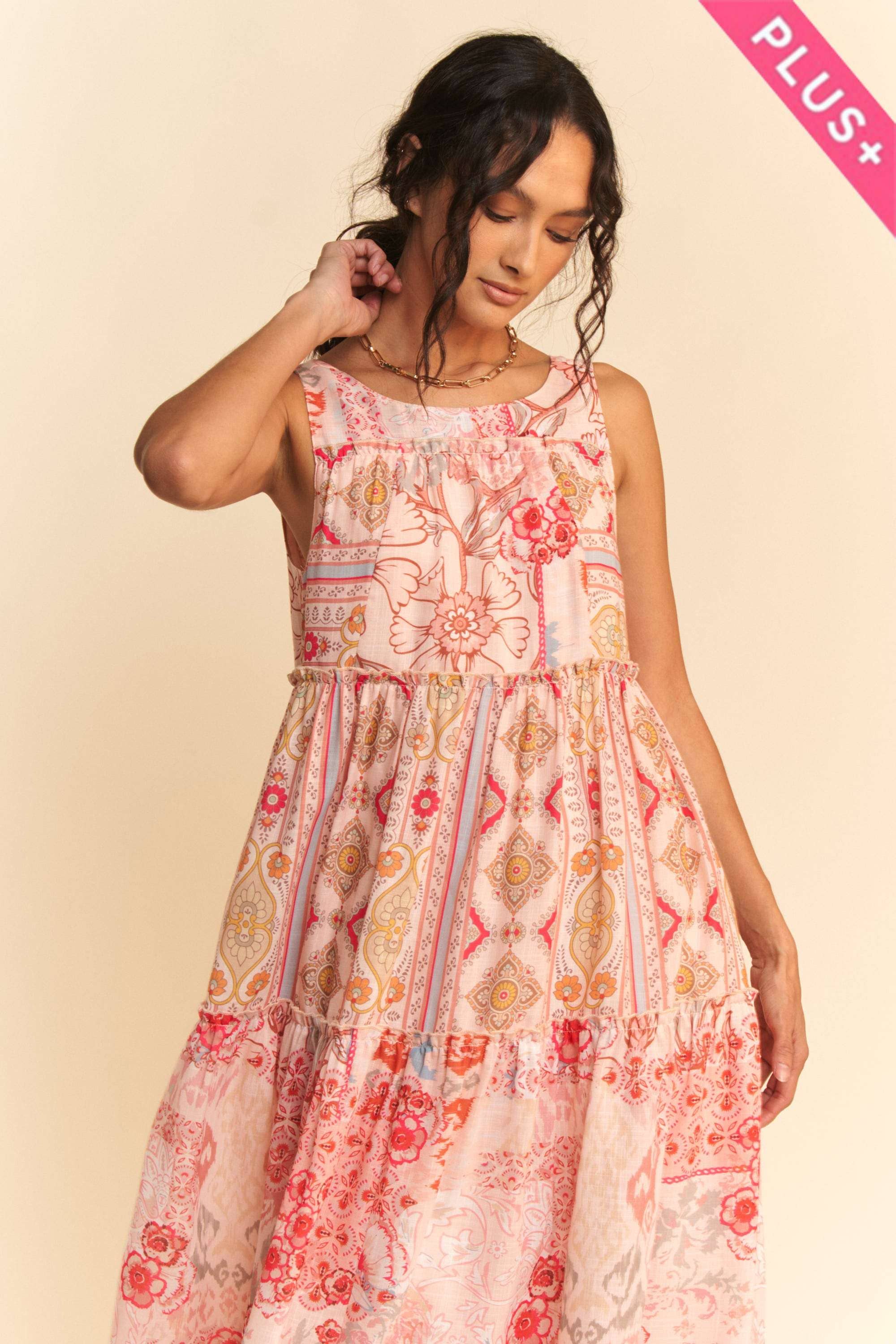 Coral Multi PLUS GEO FLORAL MIX SLEEVELESS TIRERED MAXI DRESS for wholesale on Faire5