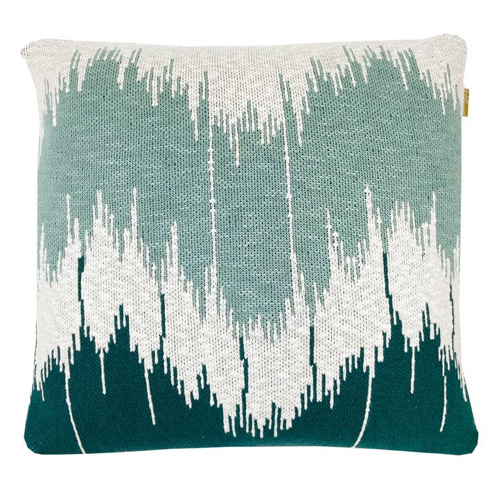 Coussin tricoté motif vague vert pour la vente par Malagoon