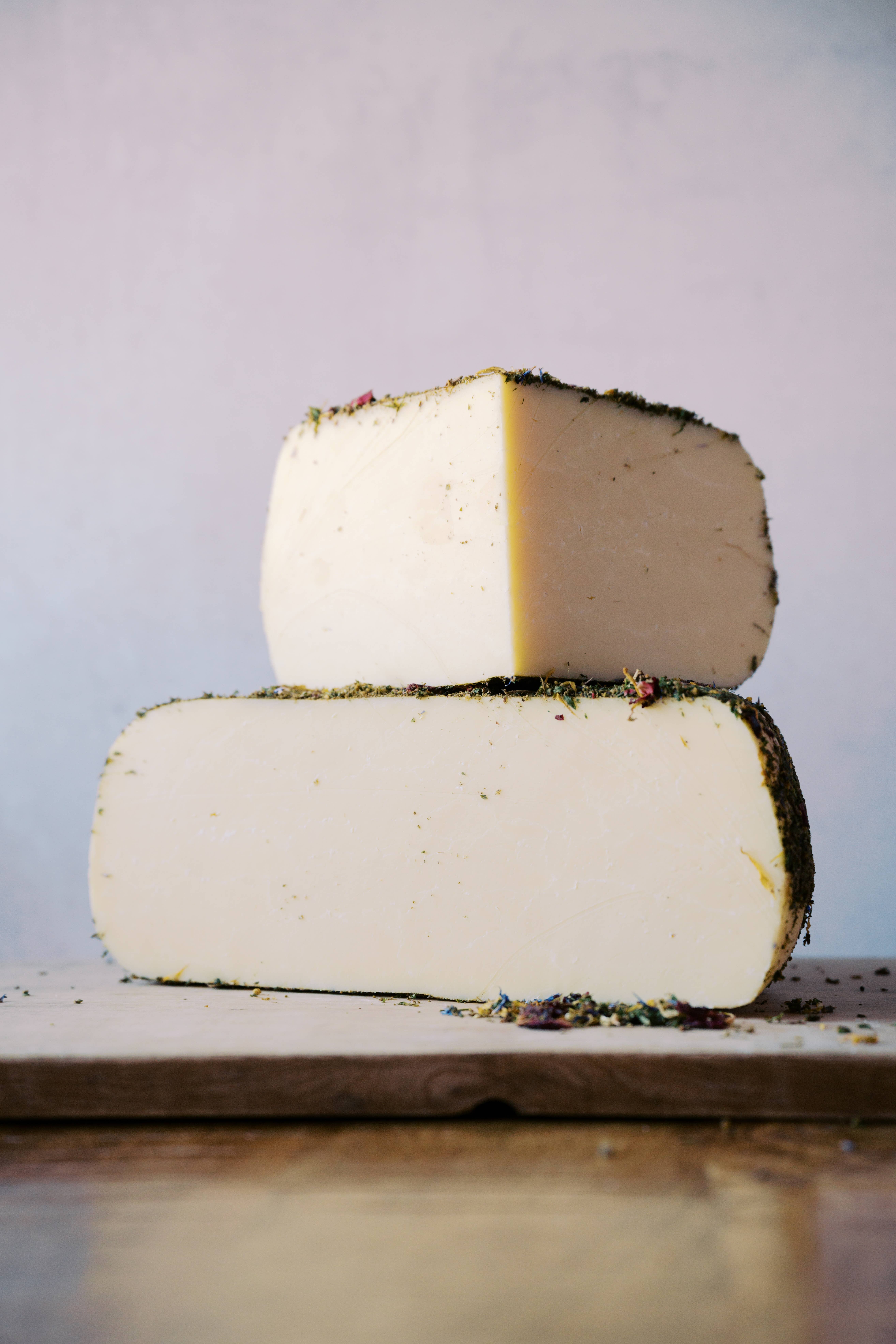 Landmark Creamery, LLC - Wholesale Cheese - Fontina Herbes de Provence cheese (1/2 lb precuts) 1