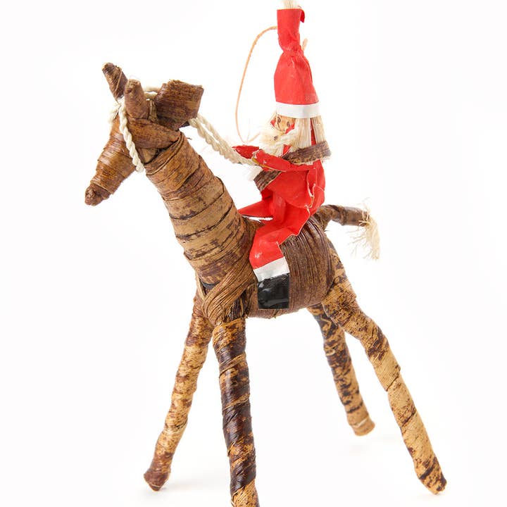 Swahili | AFRICAN MODERN - Wholesale Ornament - Banana Fiber Santa on Giraffe