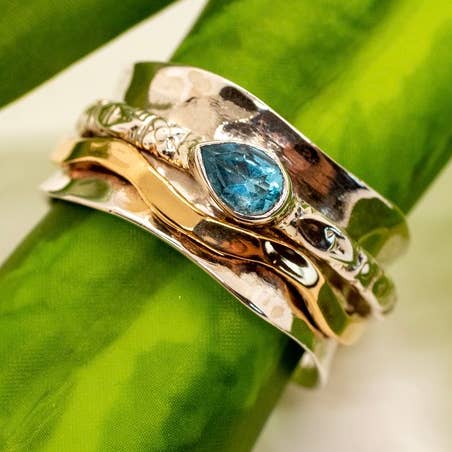 Baizaar - Vendita all'ingrosso Anelli con pietra singola/solitario - Anello Wave Spinner in argento sterling con topazio blu0