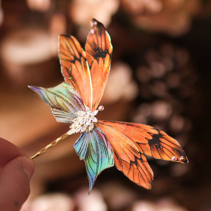 Faërie brudparad hårspänne med sagovingar för wholesale av Faërie