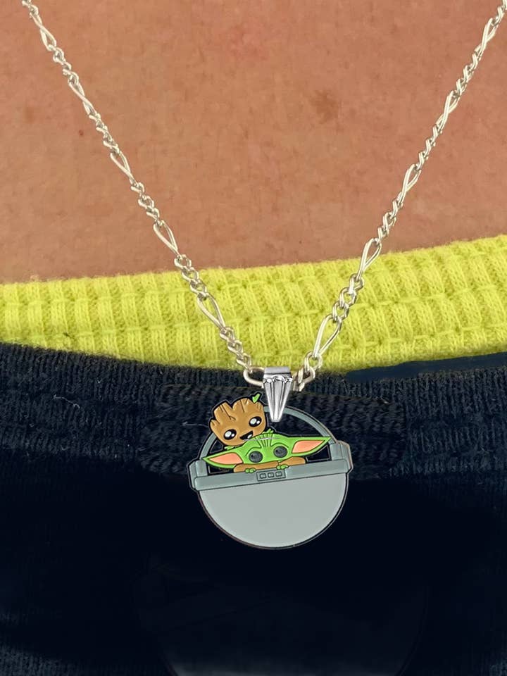 Grogu and Groot Joyriding Pendant for wholesale by Ye Little Trinket Shop
