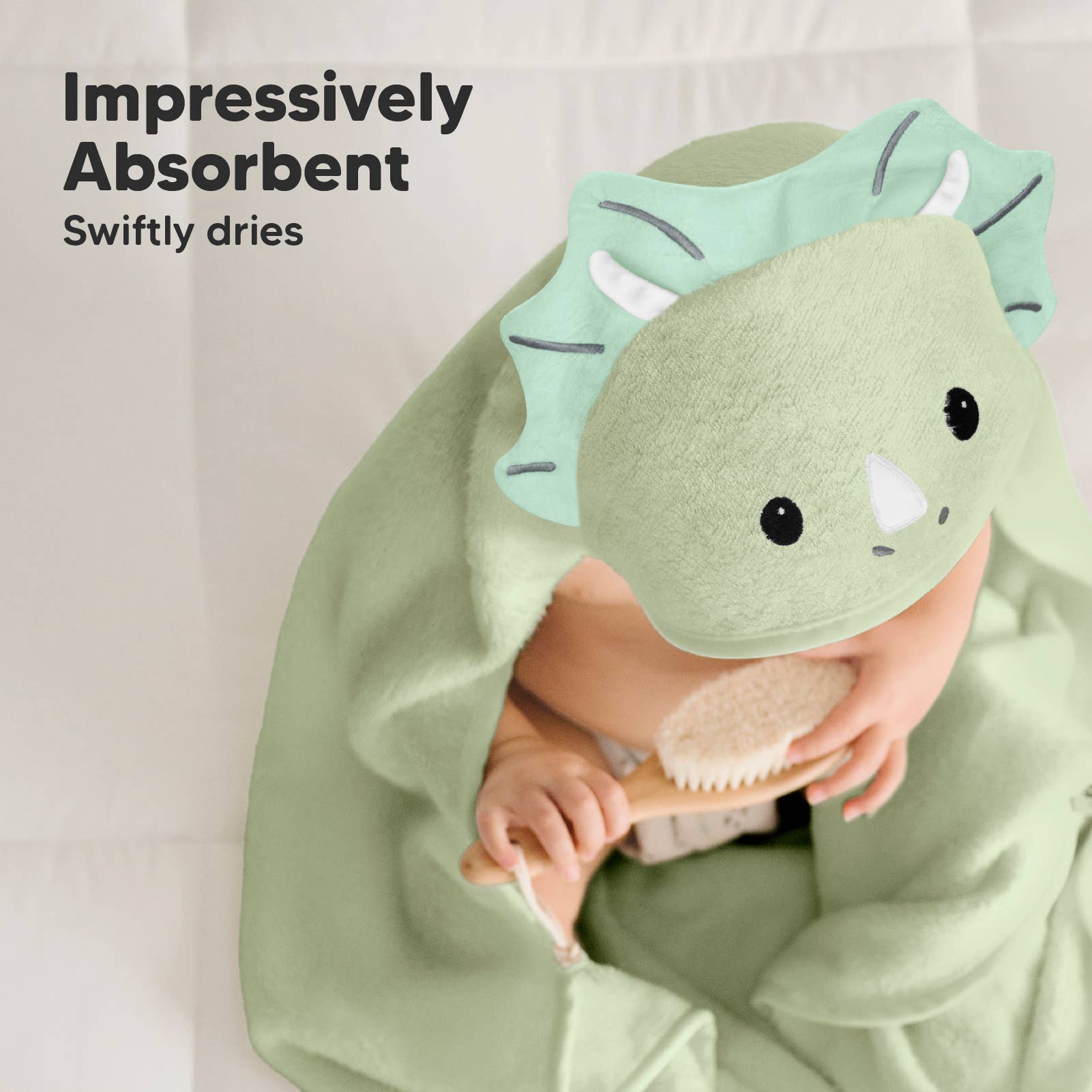 Triceratops KeaBabies Cuddle Baby Hooded Towel for wholesale on Faire5