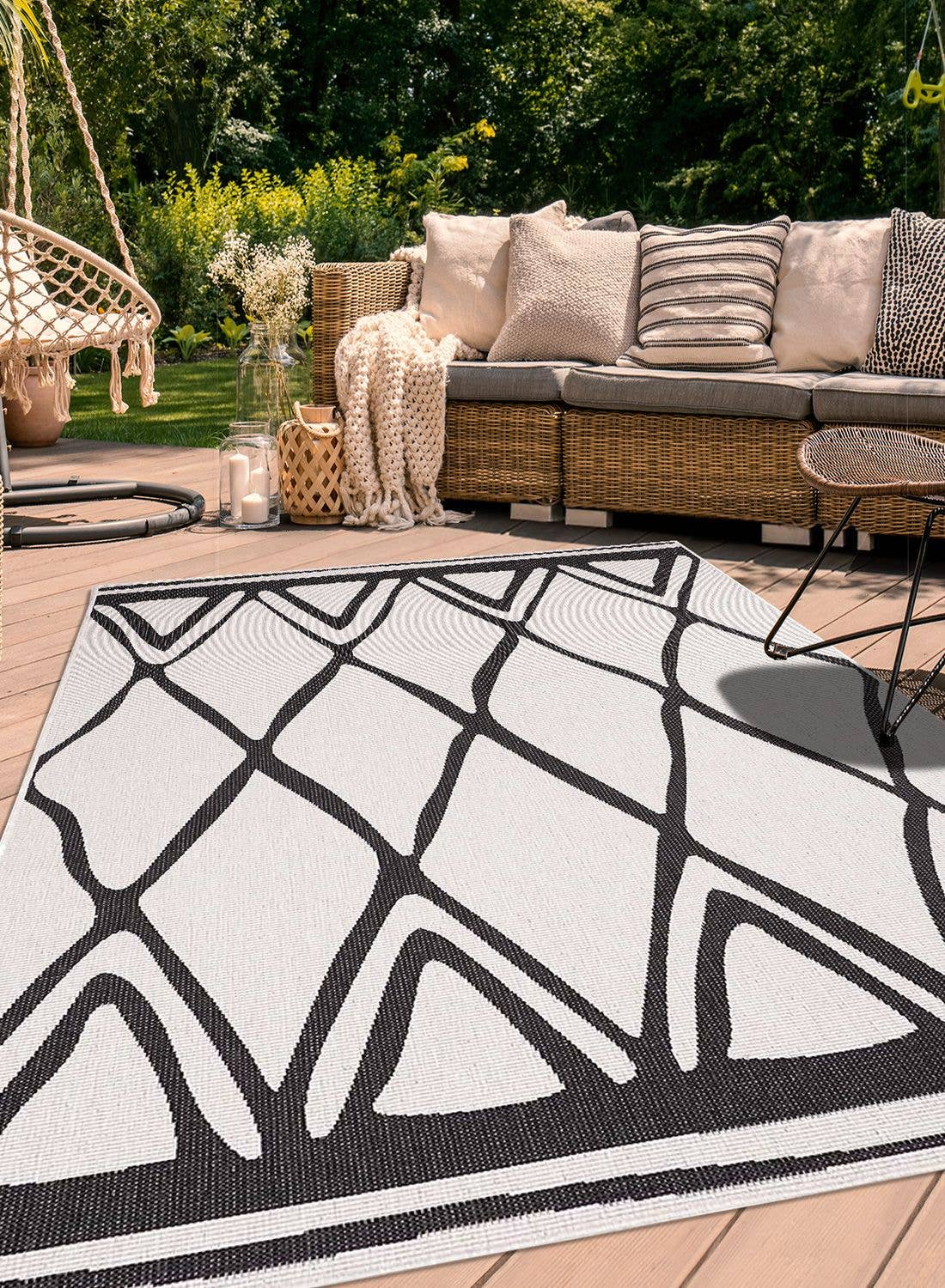 Black AF ARIBIA REVERSIBLE Polypropylene Outdoor Rug for wholesale on Faire3