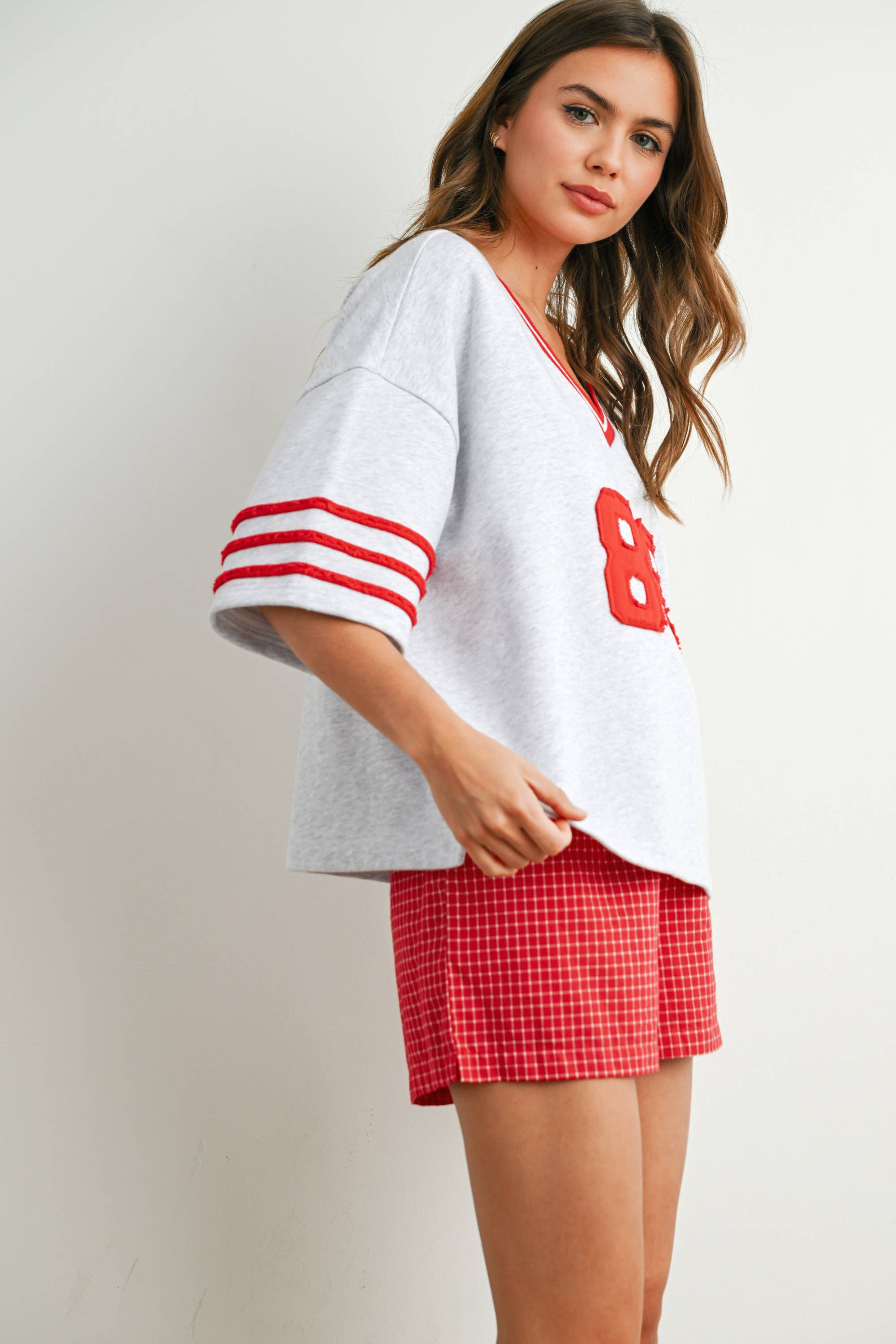 BUTTERMELON - Vendita all'ingrosso Maglietta - Donna - Maglia oversize sporty Varsity Spirit - BMT773433