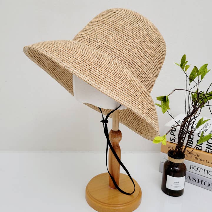 100% Natural Raffia Beach Hat, removable chin strap and other Purchase Wholesale raffia hat. Free Returns & Net 60 Terms on Faire trending on Faire.