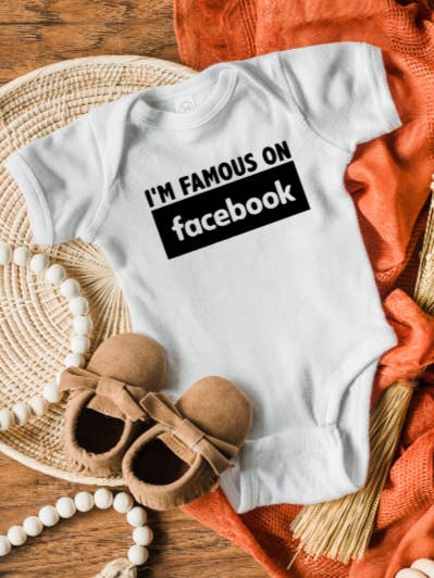 Famous On Facebook Onesie for wholesale by Pine & Fiber Co.