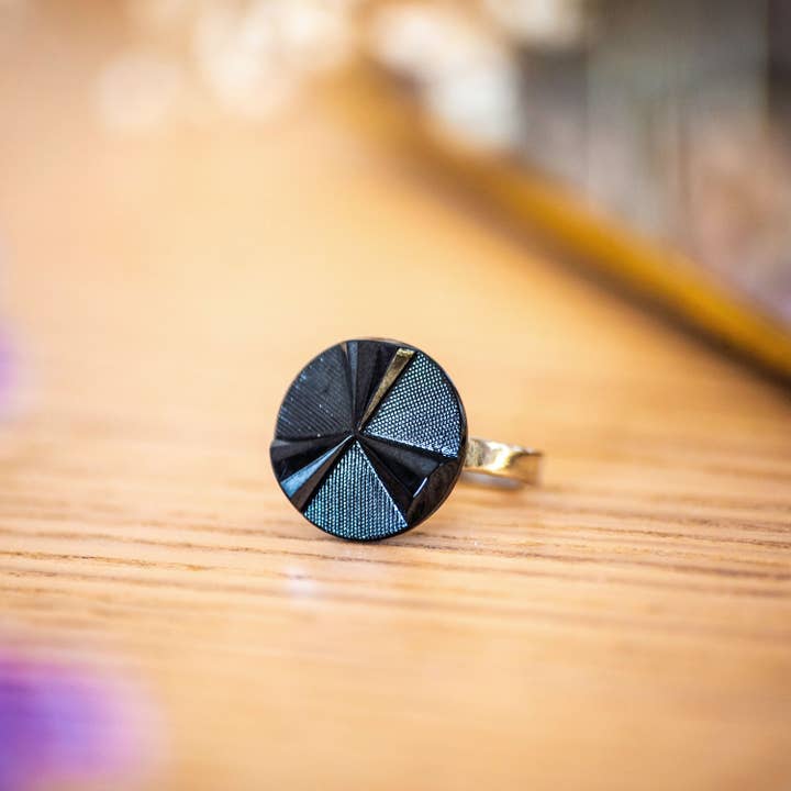 Little blue Angèle button ring for wholesale by Assuna