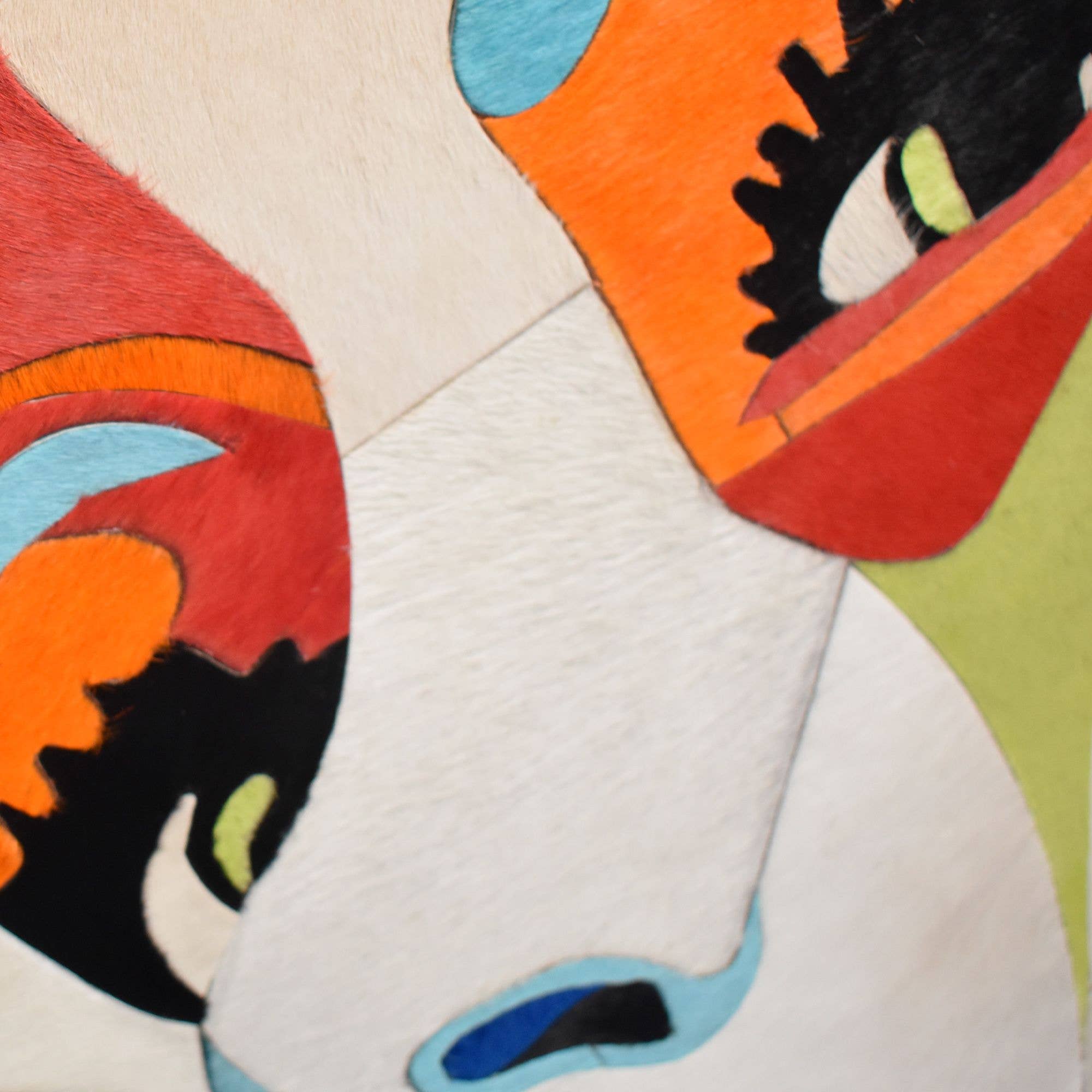 multicoloured FACE Handmade Animal Skin Table for wholesale on Faire2