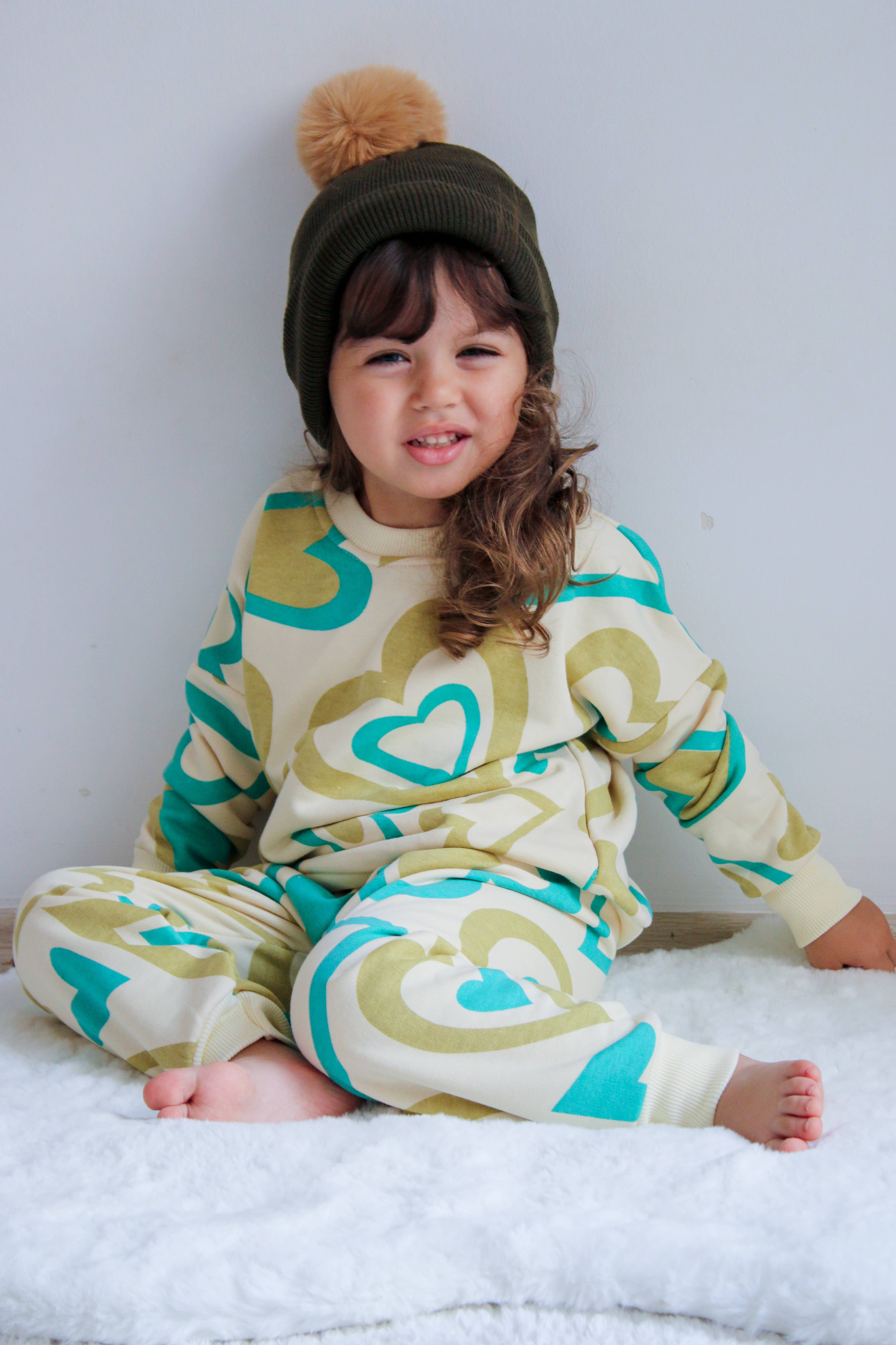 Camel Single Pom Pom Baby/Kid's Green Beanie Hat, 0 to 8 Years for wholesale on Faire9