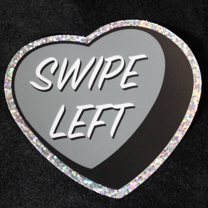 Sticker: Swipe Left Candy Heart 3" sparkly holographic vinyl for wholesale by Rude Clam