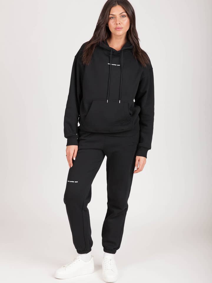 "SORRY PARDON QUOI" Damhoodie i svart för wholesale av Lazypants