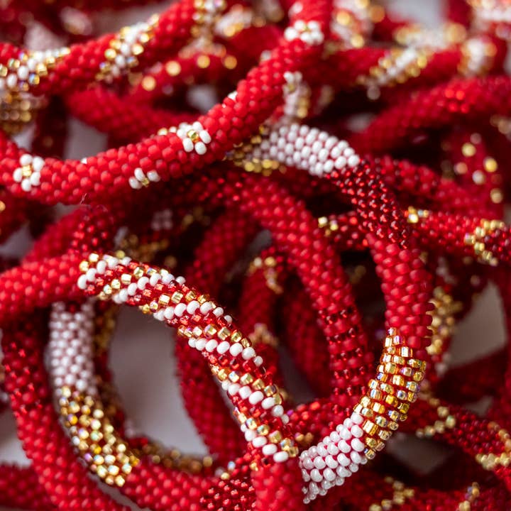 Aid Through Trade - Wholesale Jewelry Set - The Original Roll-On® Bracelet Cinnamon - Set of 122