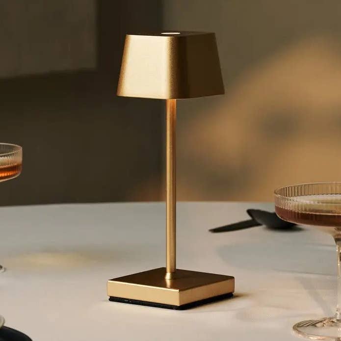 Sarphati Mini Gold Cordless Table Lamp | Rechargeable via Charging Station & 3 Light Modes for wholesale by Tavellio