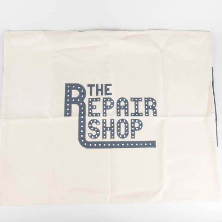 The Repair Shop Tea Towel for wholesale by Sting in the Tail Ltd