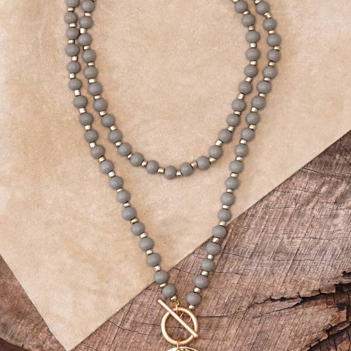Multi Strand Wooden Beads Short Coin Necklace in Grey and Gold for wholesale by PennyLine inc