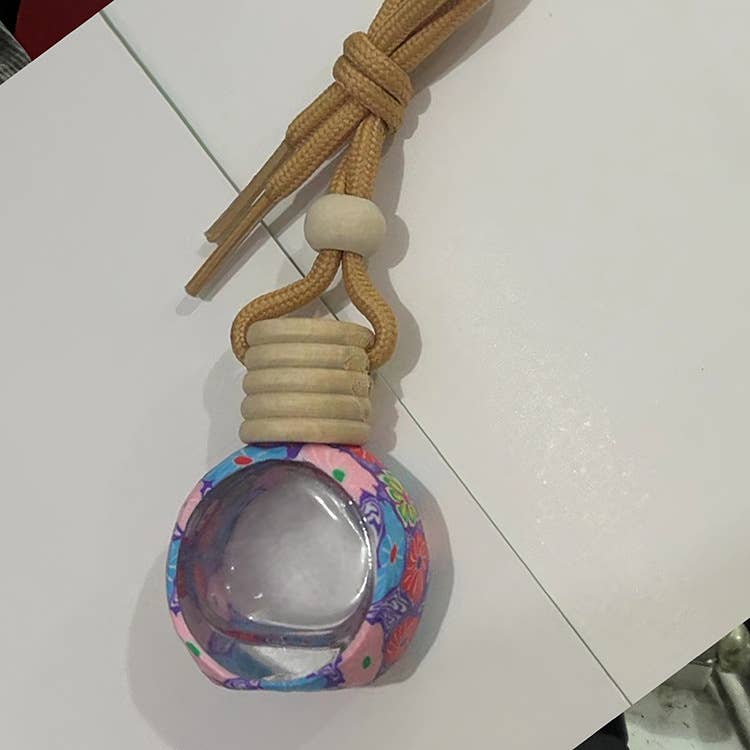 Random Artistic Floral Soft Clay Car Air Freshener Empty Bottle for wholesale on Faire6