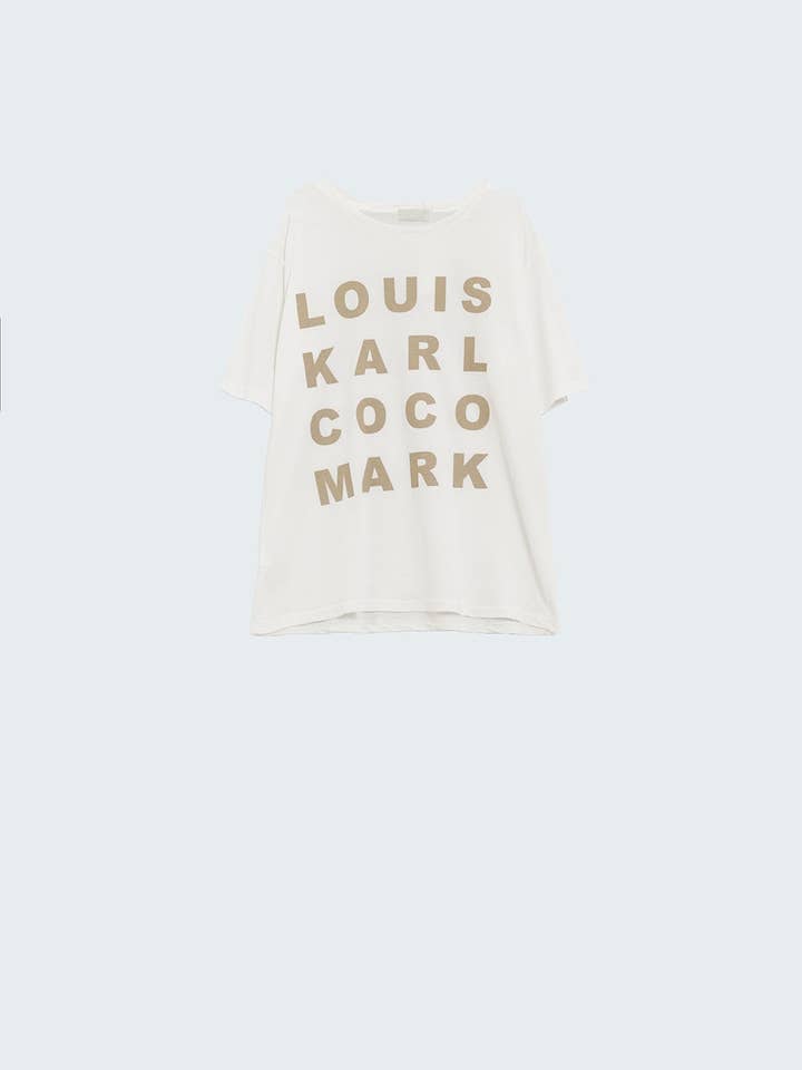 White Creme T-shirt With famous Names Logos At The Front for wholesale on Faire