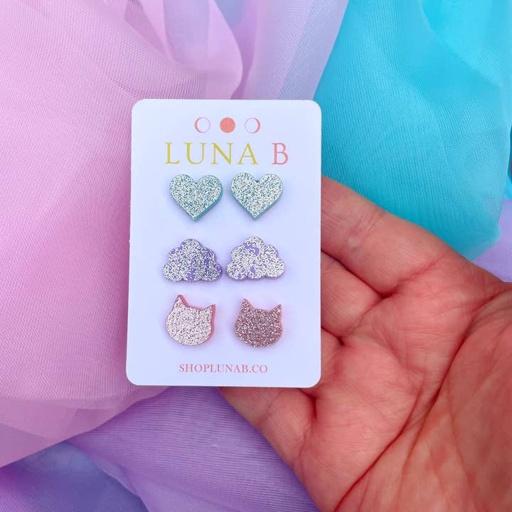 Swiftie Pop Stud Earrings 3 Pack - Taylor's Version and other Purchase Wholesale purple sprinkles. Free Returns & Net 60 Terms on Faire trending on Faire.