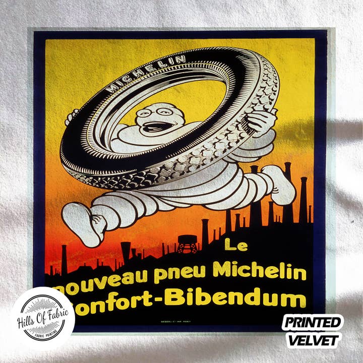 Le Nouveau Pneu Michelin Man Banden bedrukt stofpaneel voor wholesale door Hills Of Fabric