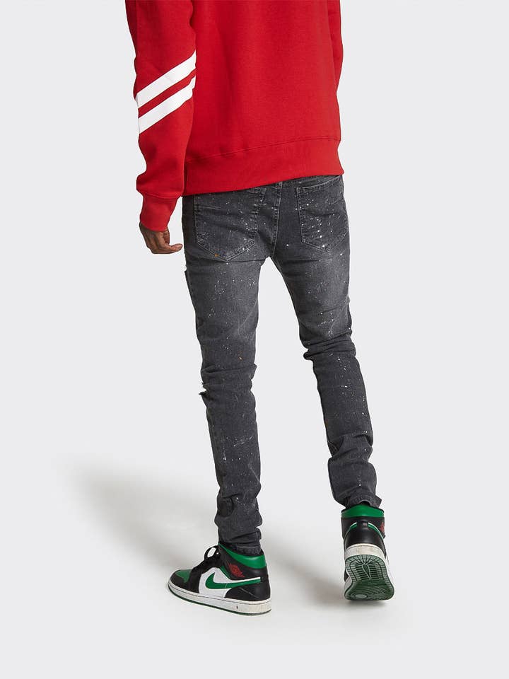 Skinny Jeans met verfspetter in vintage gewassen zwart voor wholesale door London Attitude