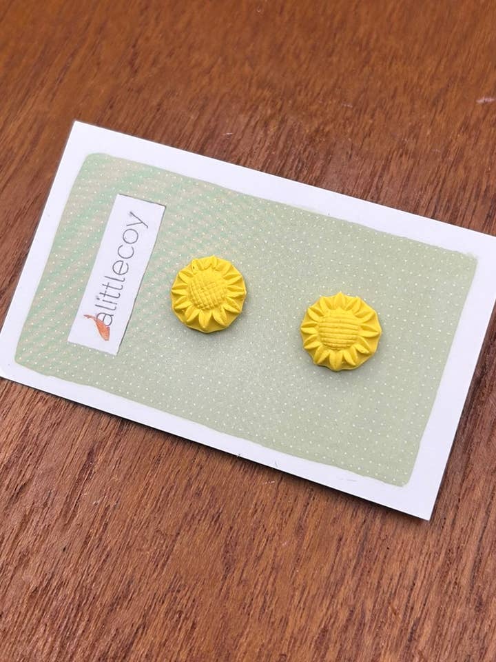 Sunflower stud earrings by alittlecoy for wholesale by alittlecoy