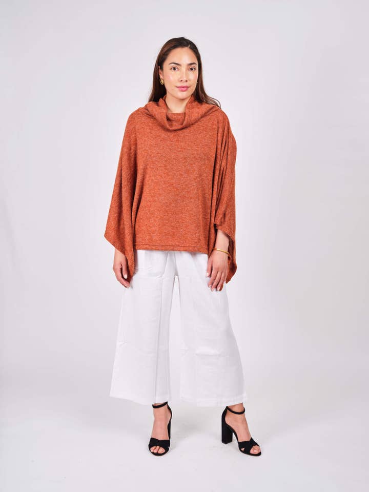 Windhorse Trading Inc – Engroshandel Overtøjsponcho – Kvinder – Poncho med halsudskæring. WN15021