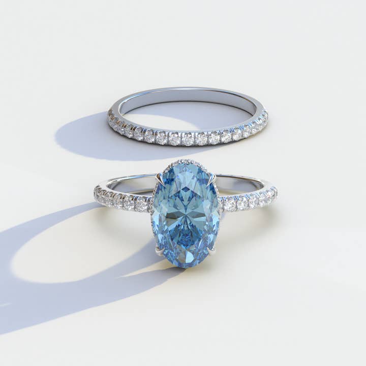 2 Carat Blue Oval Cut Hidden Halo & Pave Diamond Ring Set - Olivia for wholesale by Mohana Jewels - Luxury